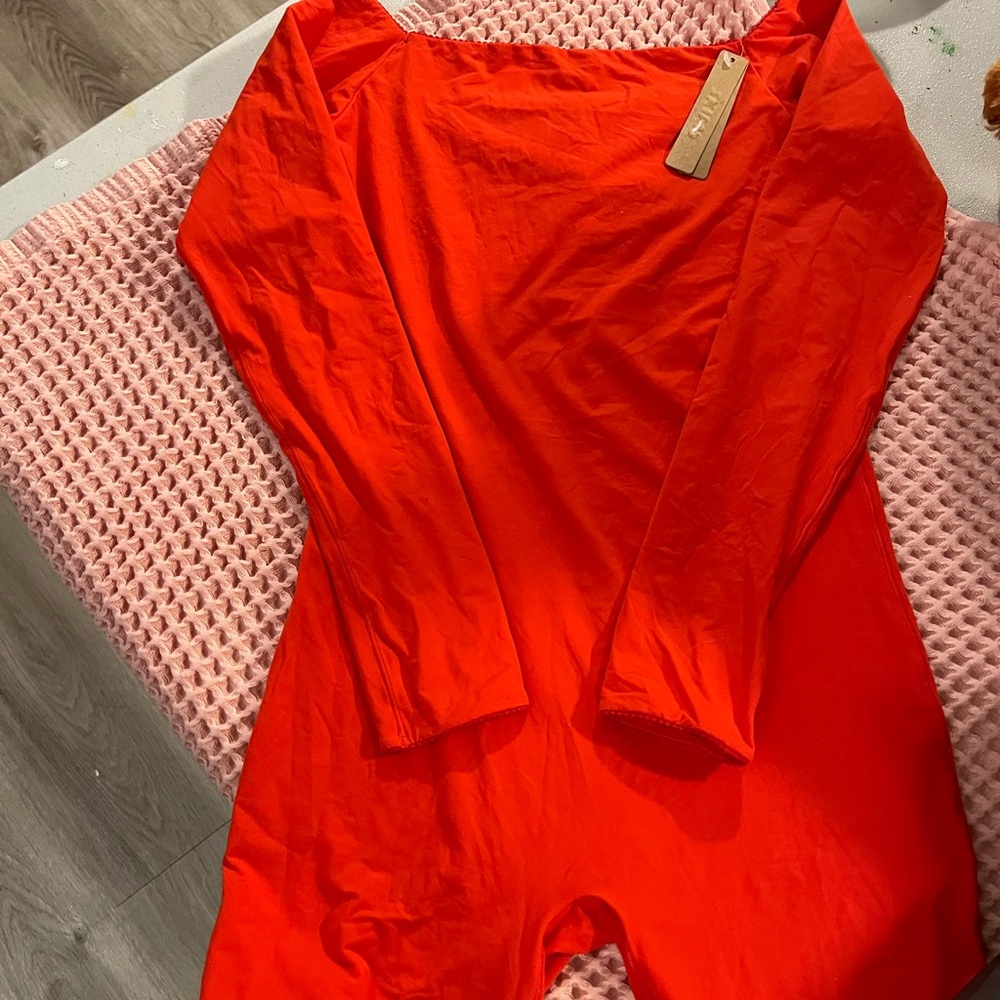 Skims open back onesie